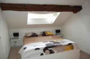 Postel nebo postele na pokoji v ubytování Appartement Fleurs des champs - Esc'Appart