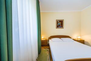 Cama o camas de una habitación en Apartments Stana