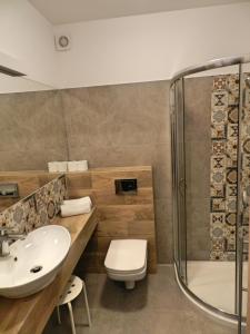 Kúpeľňa v ubytovaní Apartamenty EverySky - Osiedle Podgórze 1D-27