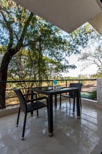 Balkón nebo terasa v ubytování Hotel Phoenix Koregaon Park