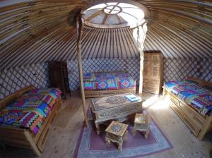 an overhead view of a yurt with two beds at Yourtes Olachat proche Annecy in Faverges