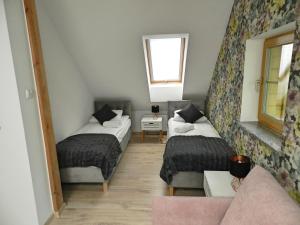 Posteľ alebo postele v izbe v ubytovaní Apartamenty EverySky - Osiedle Podgórze 1D-27