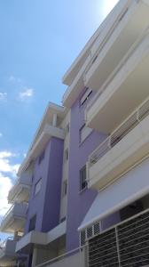 a purple apartment building with the sky in the background at Casa vacanza San Salvo in San Salvo