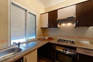 Kuchyň nebo kuchyňský kout v ubytování Alcudia Smir Apartment