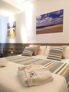 Letto o letti in una camera di Sobrado Boutique Hotel