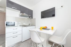 Kuchyň nebo kuchyňský kout v ubytování Guesthouse Pezo