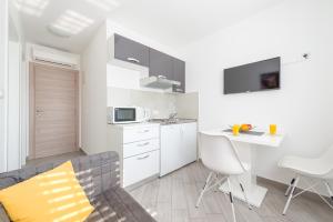 Kuchyň nebo kuchyňský kout v ubytování Guesthouse Pezo