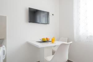 TV a/nebo společenská místnost v ubytování Guesthouse Pezo