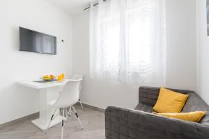 TV a/nebo společenská místnost v ubytování Guesthouse Pezo