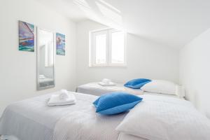 Postel nebo postele na pokoji v ubytování Guesthouse Pezo