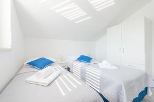 Postel nebo postele na pokoji v ubytování Guesthouse Pezo