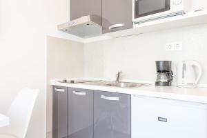 Kuchyň nebo kuchyňský kout v ubytování Guesthouse Pezo