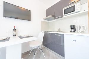 Kuchyň nebo kuchyňský kout v ubytování Guesthouse Pezo