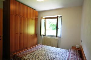 Postel nebo postele na pokoji v ubytování Residence Cirese