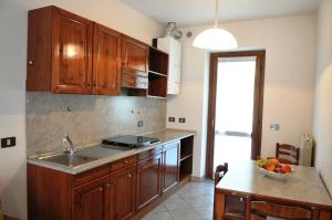 Kuchyň nebo kuchyňský kout v ubytování Residence Cirese