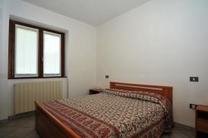 Postel nebo postele na pokoji v ubytování Residence Cirese