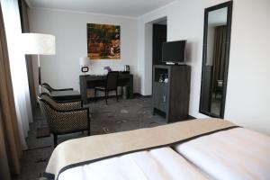Postel nebo postele na pokoji v ubytování Park Hotel am Berliner Tor