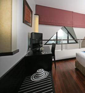 Postel nebo postele na pokoji v ubytování Hotel Tahiti Nui + 16 fotografií