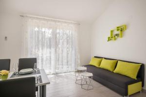 Posedenie v ubytovaní Apartments Gracia
