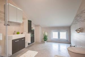 Kuchyňa alebo kuchynka v ubytovaní Apartments Gracia