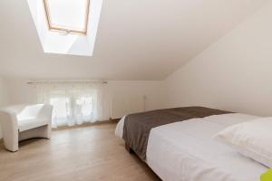 Posteľ alebo postele v izbe v ubytovaní Apartments Gracia