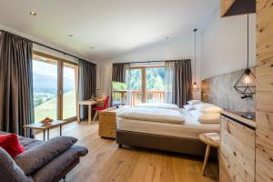 Posteľ alebo postele v izbe v ubytovaní Hotel Der Bär + 37 fotografií