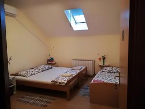 Postel nebo postele na pokoji v ubytování Hostel Poslon