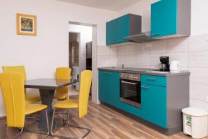Kuchyňa alebo kuchynka v ubytovaní Cakic apartmani