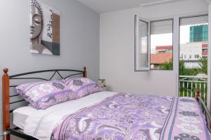 Posteľ alebo postele v izbe v ubytovaní Cakic apartmani