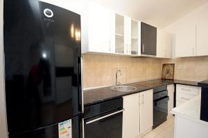 Kuchyň nebo kuchyňský kout v ubytování Apartment Boljevic