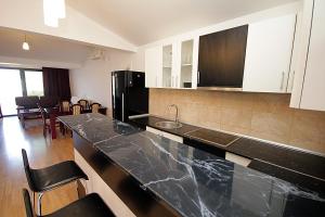 Kuchyň nebo kuchyňský kout v ubytování Apartment Boljevic