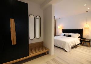 Cama ou camas em um quarto em Mykonos Cactus