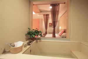 Un baño de Ying Xiang Wen Quan Hotel