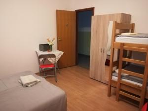 Postel nebo postele na pokoji v ubytování Hostel Poslon
