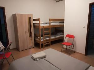 Postel nebo postele na pokoji v ubytování Hostel Poslon