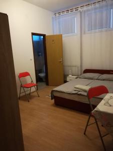 Postel nebo postele na pokoji v ubytování Hostel Poslon