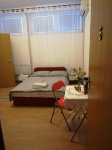 Postel nebo postele na pokoji v ubytování Hostel Poslon