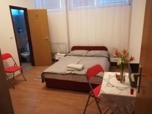 Postel nebo postele na pokoji v ubytování Hostel Poslon