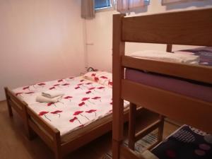 Postel nebo postele na pokoji v ubytování Hostel Poslon