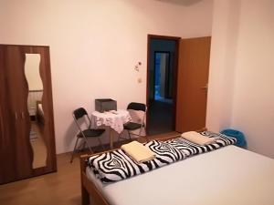 Postel nebo postele na pokoji v ubytování Hostel Poslon