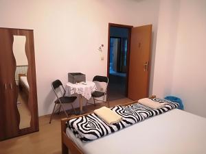 Postel nebo postele na pokoji v ubytování Hostel Poslon