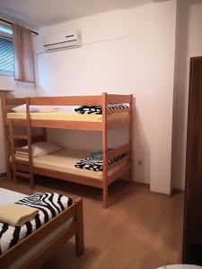 Postel nebo postele na pokoji v ubytování Hostel Poslon