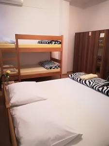 Postel nebo postele na pokoji v ubytování Hostel Poslon