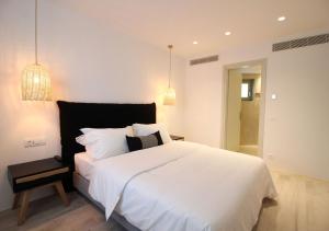 Cama ou camas em um quarto em Mykonos Cactus
