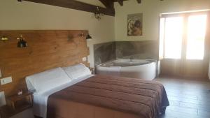 Posteľ alebo postele v izbe v ubytovaní Apartamento del Abuelo