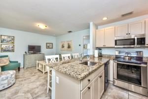 a kitchen with a sink and a counter top at Le Monaco Condo at Olde Naples in Naples