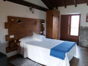 Posteľ alebo postele v izbe v ubytovaní Apartamento del Abuelo