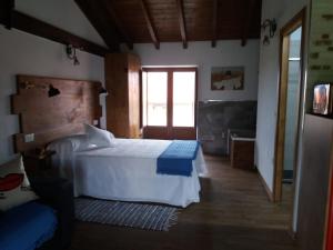Posteľ alebo postele v izbe v ubytovaní Apartamento del Abuelo