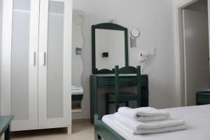 Postel nebo postele na pokoji v ubytování Mare Blue Ios