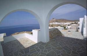 a view of the ocean from a balcony of a building at Belvedere Apartments in Chora Folegandros